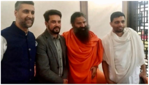 Shri Nikhil Nanda, Hardeep Singh Puri, Swami Baba Ramdev Ji, and Acharya Balkrishna Ji