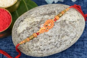 Orange Stones Rakhi