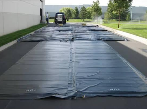 Concrete Blankets vs. Insulated Tarps for Curing Concrete 